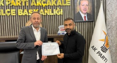 AK Parti Akçakale'de Mehmet Akdağ'a Teşekkür Belgesi Takdim Edildi