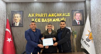 AK Parti Akçakale'de Yeni Üyelere Teşekkür Belgesi Takdim Edildi