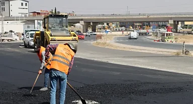 Büyükşehir'in asfalt çalışması esnafın yüzünü güldürdü